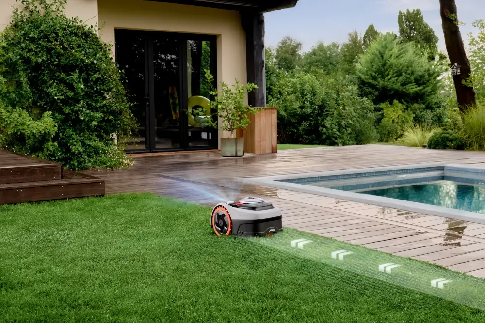Znajdowanie krawędzi – precyzyjna praca przy obrzeżach Robot koszący Segway Navimow i210 AWD – znajdowanie krawędzi i precyzyjne koszenie przy obrzeżach
